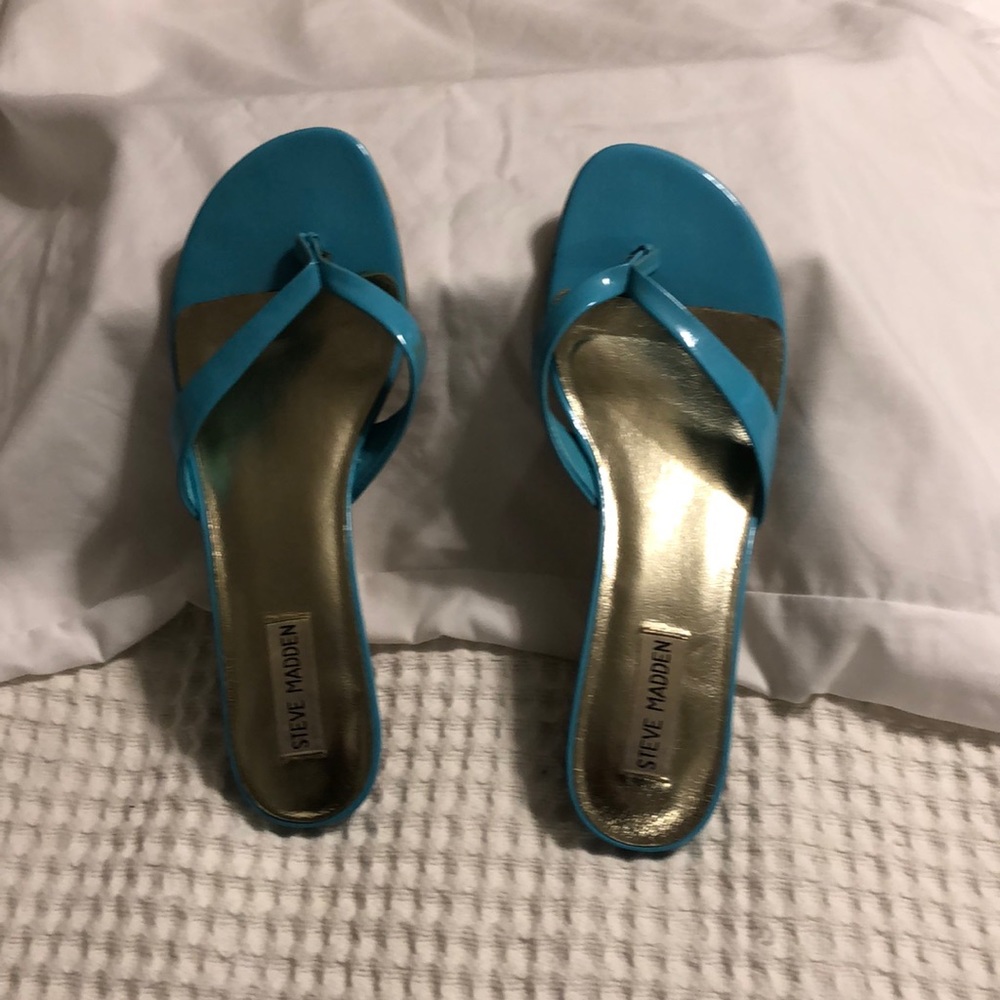 Turquoise 2” slides.  Worn once